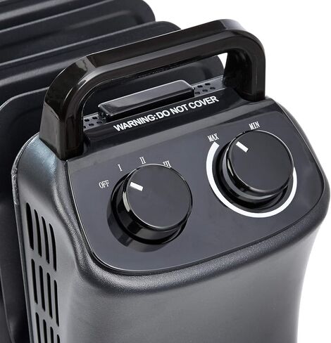 Amazon Basics Portable Radiator Heater with 7 Wavy Fins, Manual Control, Black, 1500W, 13.1 x 26.3 x 9.8 in in Saudi Arabia