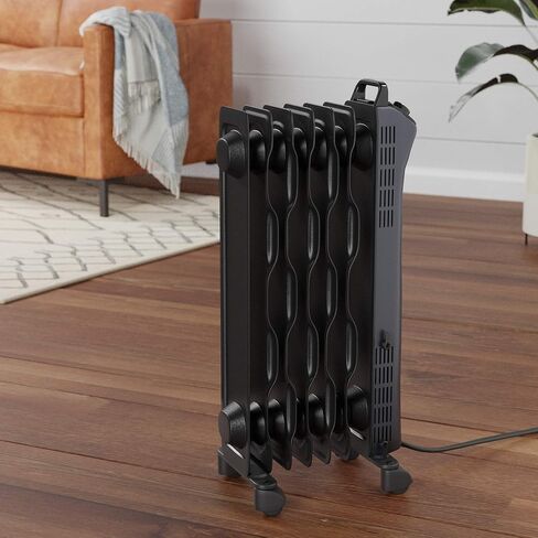 Amazon Basics Portable Radiator Heater with 7 Wavy Fins, Manual Control, Black, 1500W, 13.1 x 26.3 x 9.8 in in Saudi Arabia