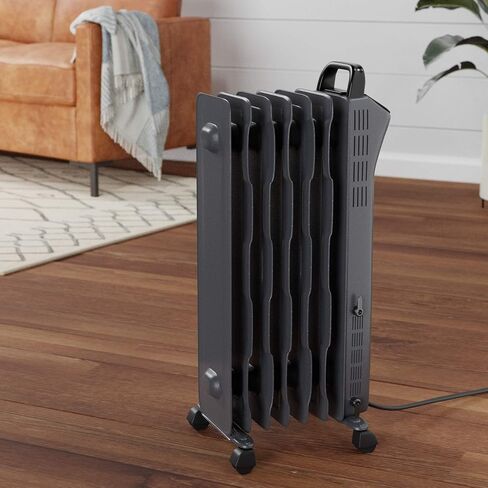 Amazon Basics Portable Radiator Heater with 7 Wavy Fins, Manual Control, Black, 1500W, 13.1 x 26.3 x 9.8 in in Saudi Arabia
