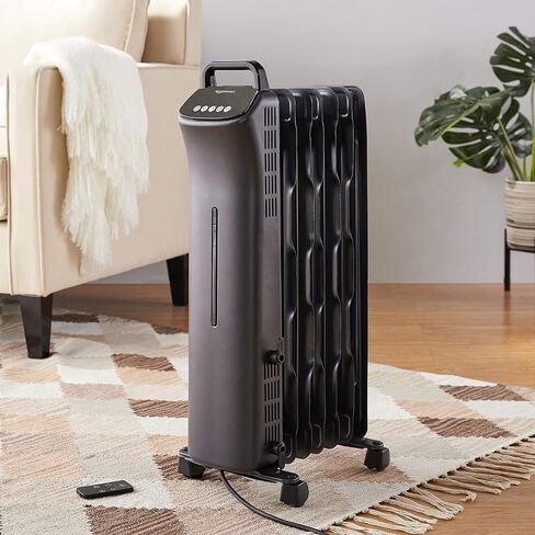 Amazon Basics Portable Radiator Heater with 7 Wavy Fins, Manual Control, Black, 1500W, 13.1 x 26.3 x 9.8 in in Saudi Arabia