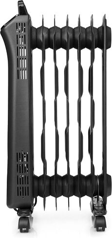 Amazon Basics Portable Radiator Heater with 7 Wavy Fins, Manual Control, Black, 1500W, 13.1 x 26.3 x 9.8 in in Saudi Arabia
