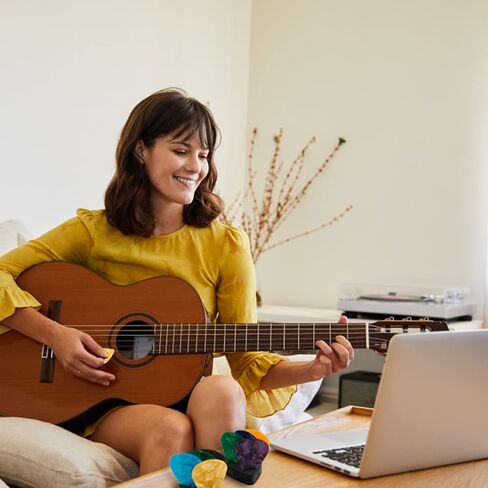 20 Pieces of Guitar Paddles with 2 Storage Boxes and 10 Transparent Anti-Slip Stickers, Featuring A Selection of Colorful and Cute Thumb Guitar Paddles in Saudi Arabia