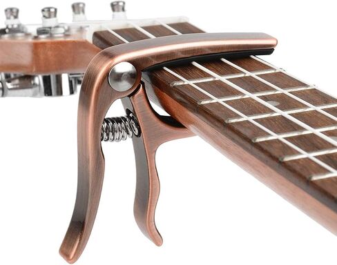 Ukulele Capo, with 2 Felt Picks for Soprano and Concert Ukulele – Professional and Lightweight Mini Size Zinc Alloy 4 String Uke Kapo (Gold) in Kuwait