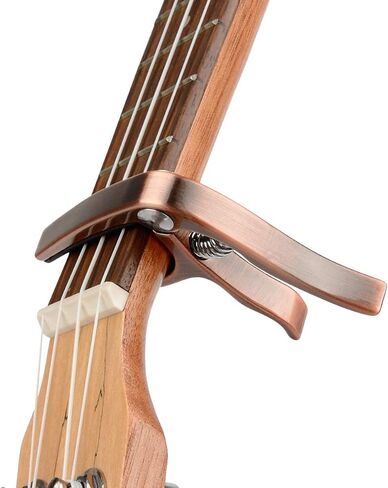 Ukulele Capo, with 2 Felt Picks for Soprano and Concert Ukulele – Professional and Lightweight Mini Size Zinc Alloy 4 String Uke Kapo (Gold) in Kuwait