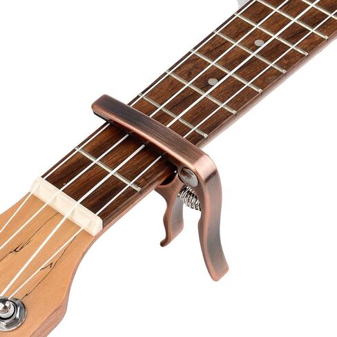Ukulele Capo, with 2 Felt Picks for Soprano and Concert Ukulele – Professional and Lightweight Mini Size Zinc Alloy 4 String Uke Kapo (Gold) in Kuwait
