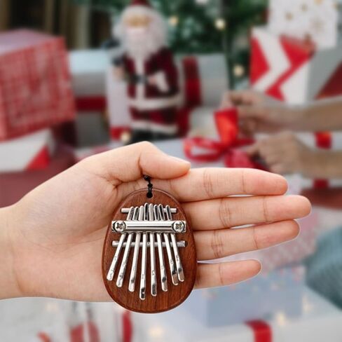 Ubblove ميني كاليمبا الإبهام البيانو 8 مفاتيح رائعة الخشب لطيف إصبع الماريمبا مع الحبل المحمولة الموسيقية قلادة هدية للأطفال البالغين in Kuwait