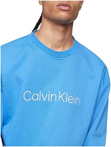 Calvin Klein Men's Relaxed Fit Logo French Terry Crewneck Sweatshirt in Kuwait