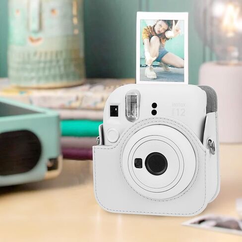 حافظة كاميرا فورية بلون ثابت متوافقة مع كاميرا Fujifilm Instax Mini 12 الفورية - حقيبة كاميرا صغيرة 12 حقيبة من جلد البولي يوريثان مع جيب وحزام كتف قابل للتعديل وألبوم 64 جيب (أزرق سماوي) in Kuwait
