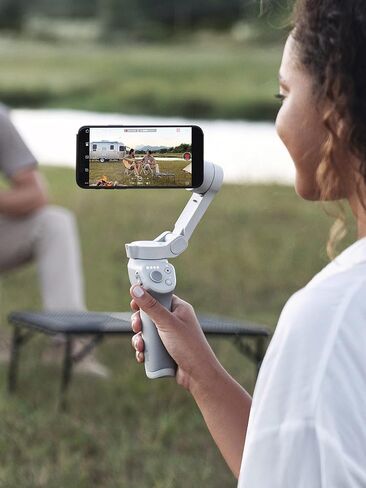 DJI OM 4 - مثبت جيمبال للهواتف الذكية ثلاثي المحاور مع قبضة وحامل ثلاثي القوائم ومثبت جيمبال مثالي لمدونات الفيديو واليوتيوب والفيديو المباشر ومثبت الهاتف المتوافق مع iPhone وAndroid in Kuwait