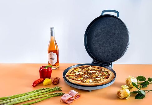 Courant Pizza Maker 12-inch Pizzas Machine, Newly improved Cool-touch Handle Non-Stick plates Pizza oven & Calzone Maker, Electric Countertop Oven for Home or School, 12" Indoor Grill/Griddle, Gray in Kuwait