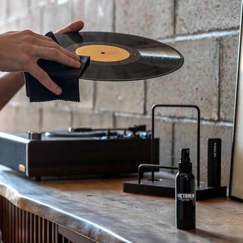 Victrola 'The Kit' - مجموعة تنظيف أسطوانات الفينيل، يمكن استخدامها كحامل تسجيل، وتتضمن فرشاة مضادة للكهرباء الساكنة، ومحلول تنظيف، وقماش، وحامل بلمسة نهائية من خشب الإسبريسو مع لمسات معدنية سوداء ذكية in Kuwait