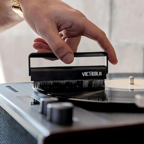 Victrola 'The Kit' - مجموعة تنظيف أسطوانات الفينيل، يمكن استخدامها كحامل تسجيل، وتتضمن فرشاة مضادة للكهرباء الساكنة، ومحلول تنظيف، وقماش، وحامل بلمسة نهائية من خشب الإسبريسو مع لمسات معدنية سوداء ذكية in Kuwait