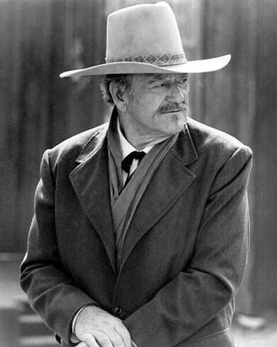 Wayne wears overcoat & stetson as J.B. Books 1976 The Shootist 8x10 photo in Saudi Arabia