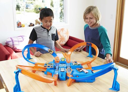 Hot Wheels Toy Car Track Set, Criss Cross Crash with 1:64 Scale Vehicle, Powered by a Motorized Booster (Amazon Exclusive) in Saudi Arabia