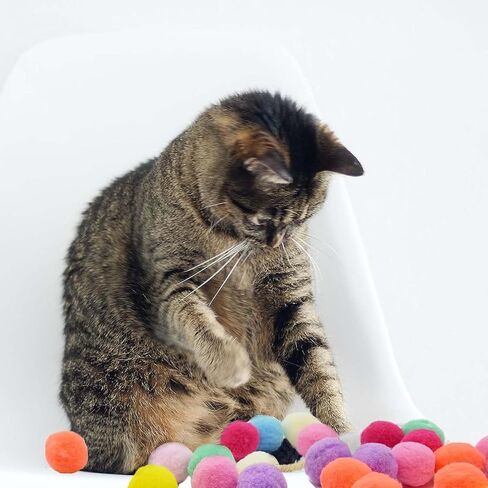 Interactive Cat Toy Ball Launcher Pistol with 100 Pcs Pom Pom Balls, Magic Pet Fetch Gun Shooter, Flying Plush Ball Shooting Play for Dogs and Kittens, Fun and Fuzzy Games Training for Indoor Kitties in Saudi Arabia