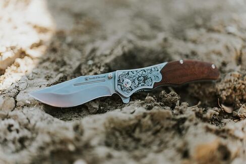 Smith & Wesson Accessories Smith & Wesson Unwavered Folder Featuring Engraved Rosewood Handle, Drop Point Blade, and 8Cr13MoV Stainless Steel in Saudi Arabia