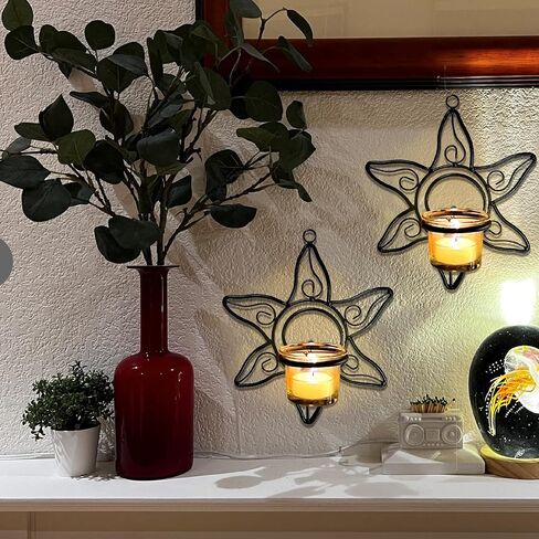 حامل شموع على شكل شمعدان حائطي دوامي من Lily’s Home Deco، فولاذ، أسود، مجموعة من 2، مع 2 حامل شموع من الزجاج الشفاف in Kuwait
