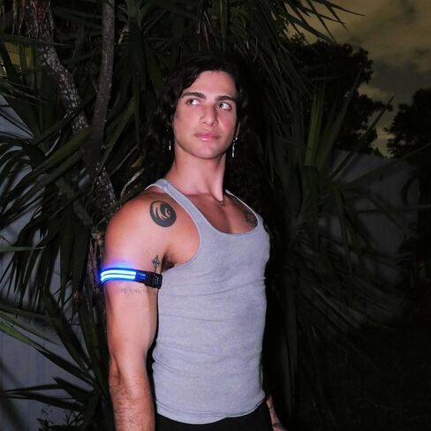 حزام يد مخطط بإضاءة LED من House Of Rave لملابس المهرجانات - إكسسوار Cyberpunk Rave المستقبلي للرجال والنساء - شريط ذراع متوهج (برتقالي) in Kuwait