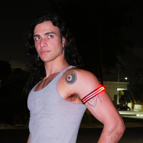 حزام يد مخطط بإضاءة LED من House Of Rave لملابس المهرجانات - إكسسوار Cyberpunk Rave المستقبلي للرجال والنساء - شريط ذراع متوهج (برتقالي) in Kuwait