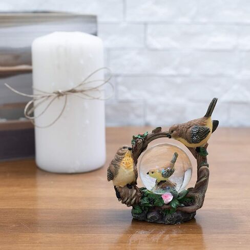 Elanze Designs Black Mask Yellow Birds Magical Whimsical Tabletop Dresser Nightstand Figurine Miniature 45MM Sturdy Polyresin Glitter Water Snow Globe Decoration in Saudi Arabia
