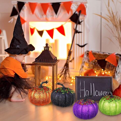 Winlyn Set of 4 Assorted Glittered and Sequined Artificial Halloween Pumpkins Decorative Pumpkins Foam Pumpkins in Orange Green Purple Black for Chic Glam Fall Halloween Table Centerpiece Decor in Saudi Arabia