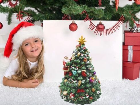 شجرة عيد الميلاد مع تيدي بير من لايت آدر، هدايا وموسيقى عيد الميلاد تلعب في مادة البولي الراتنج in Kuwait