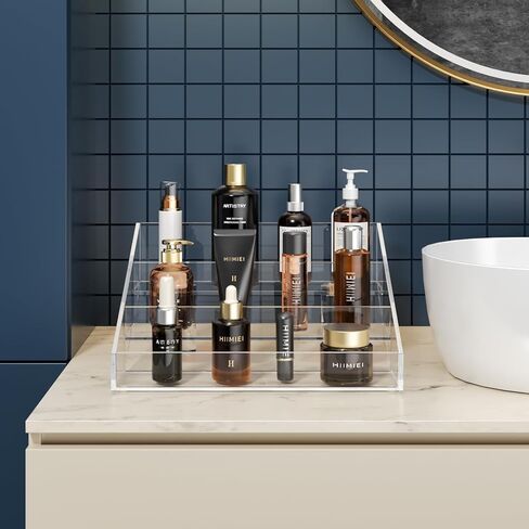 هايميي منظم عطور، حامل عطور 10 انش، عرض عطور من 3 طبقات، رف رفع اكريليك شفاف للعطور والكب كيك والاحجار الكريمة والكوريو وتماثيل الانيمي ومنتجات العناية بالبشرة (عبوتان) in Kuwait