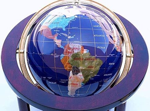 كرة أرضية كبيرة من الأحجار الكريمة وساعة على حامل الماهوجني in Kuwait