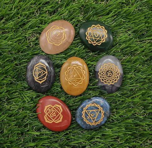 7 Chakra Oval Set Reiki Healing Crystal with Engraved Chakra Symbols - Chakra Balancing Polished Palm Stones Set with Velvet Pouch in Saudi Arabia