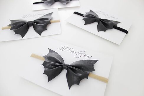 عصابات رأس من الجلد للهالوين للأطفال من LilPinkGoose لحديثي الولادة - سنة فما فوق، فيونكة شعر الهالوين (خفاش مطاطي أسود كبير) in Kuwait