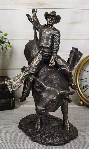 Ebros Rustic Western Rodeo Bull Rider Cowboy On Bucking Bull Statue 10.5" Tall Faux Bronze Resin Old World Wild West Cattle Bull Riding Cowboys Themed Accent Figurine in Saudi Arabia