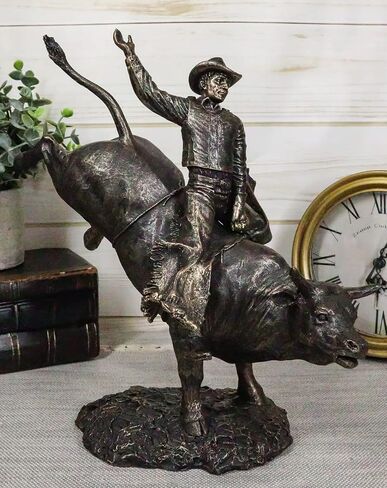 Ebros Rustic Western Rodeo Bull Rider Cowboy On Bucking Bull Statue 10.5" Tall Faux Bronze Resin Old World Wild West Cattle Bull Riding Cowboys Themed Accent Figurine in Saudi Arabia