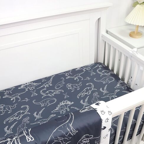 طقم سرير أطفال على شكل ديناصور من Jundetye للأولاد، طقم سرير أطفال مكون من 4 قطع لسرير الأطفال ذو الحجم القياسي، بما في ذلك اللحاف الناعم، وملاءة سرير الأطفال، وتنورة سرير مكشكشة، وحامل الحفاضات in Kuwait