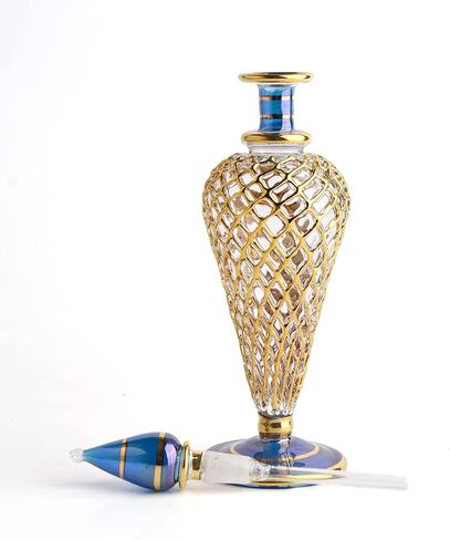 زجاجة عطر مصرية كبيرة مفردة عتيقة بحجم متوسط 7 انش (18 سم) للزيوت العطرية الذهبية المزخرفة، زجاجة فارغة من جيني بايركس من زجاج مصري مصنوع يدويا in Kuwait