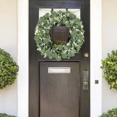 KHOYIME Eucalyptus Garland with White Flowers, 4 Packs 5.9Ft Artificial Silver Dollar Eucalyptus Leaves Plant Fake Greenery Hanging Ivy Vines Faux Wreath for Wedding Arch Party Mantle Table Home Decor in Saudi Arabia