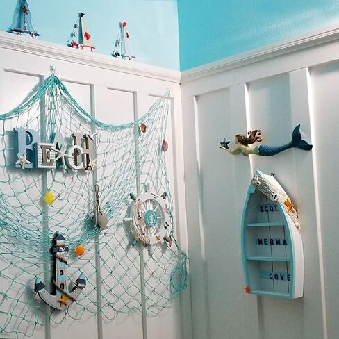 رف قارب خشبي، عرض قارب قائم بارتفاع 16.5 بوصة مع شبكة سمك ونجم البحر وصدف البحر الأبيض وديكور بحري على الشاطئ in Kuwait