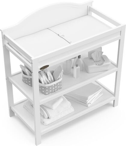 Graco Clara Changing Table (Espresso) - GREENGUARD Gold Ceritifed, Includes Bonus Water-Resistant Changing Table Pad with Safety Strap, 2 Open Shelves in Kuwait