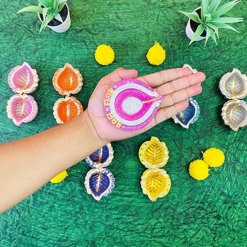 كيه اس جون مجموعة من 13 قطعة مع فتائل قطنية من الطين الطبيعي بتصميم ديوالي دياس للزينة من ديوالي دياس، مجموعة من 13 قطعة مصنوعة يدويا من الطين الطبيعي in Kuwait