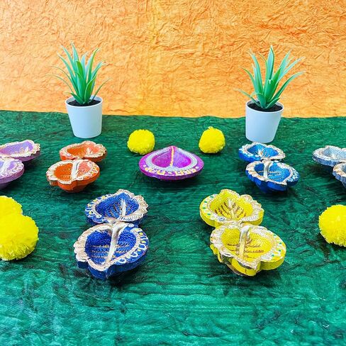 كيه اس جون مجموعة من 13 قطعة مع فتائل قطنية من الطين الطبيعي بتصميم ديوالي دياس للزينة من ديوالي دياس، مجموعة من 13 قطعة مصنوعة يدويا من الطين الطبيعي in Kuwait