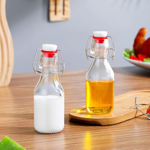 EBOOT Flip Top Glass Bottles with Caps Beer Bottles Clear Swing Top Glass Bottles Vinegar Kombucha Bottles with Stoppers Airtight Lids for Wedding Themed Baby Shower Christmas Gifts (6 Pcs,3.38 oz) in Saudi Arabia