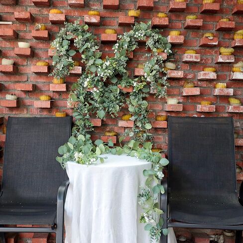 6 Ft Eucalyptus Garland for Table Centerpieces, 2 Packs Artificial Eucalyptus Vine Fake Silver Dollar Eucalyptus Garland for Wedding Backdrop Mantelpiece Arch Doorway Indoor Outdoor Greenery Decor in Saudi Arabia