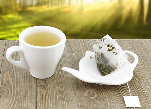 قواعد اكواب شاي من السيراميك الابيض مع مساند للملاعق، مجموعة من 4 قطع من حامل اكياس الشاي الكلاسيكية in Kuwait