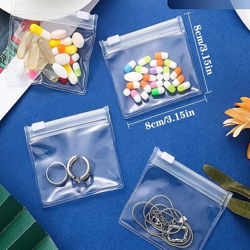 100 قطعة 3 × 3 انش حقيبة حبوب بلاستيكية بسحاب لتنظيم حبوب الدواء للسفر، منظم ادوية قابل لاعادة الاستخدام مع قفل منزلق للاغراض الصغيرة in Kuwait
