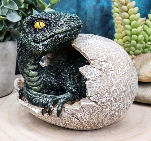 Ebros Jurassic Era Predator Hatching Dinosaur Egg Figurine 4" Tall Velociraptor in Egg Hatchling Statue Decor Sculpture As Fossil Themed Art in 3D Prehistoric Animal Collectible in Saudi Arabia