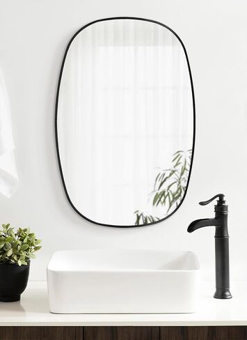 Kate and Laurel Zayda Modern Minimalist Danish Oval Wall Mirror with Sleek Metal Frame, 24x36, Black in Saudi Arabia