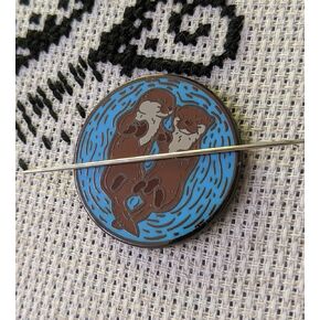 Sleeping Otters Needle Minder in Kuwait