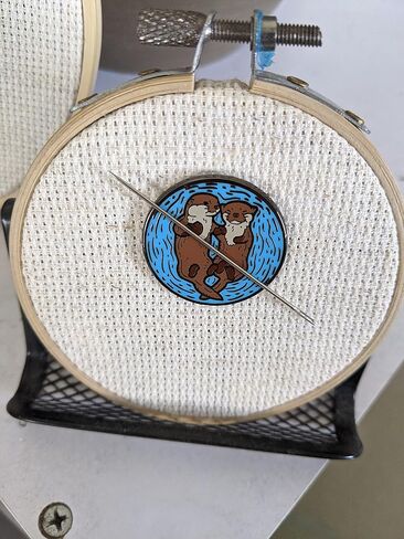 Sleeping Otters Needle Minder in Kuwait