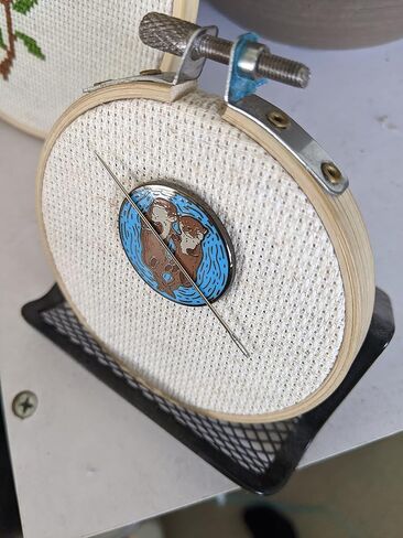 Sleeping Otters Needle Minder in Kuwait