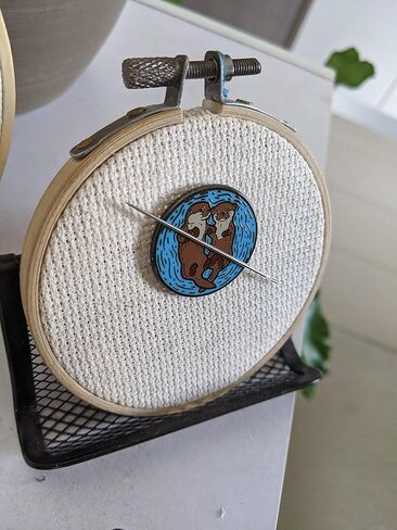 Sleeping Otters Needle Minder in Kuwait