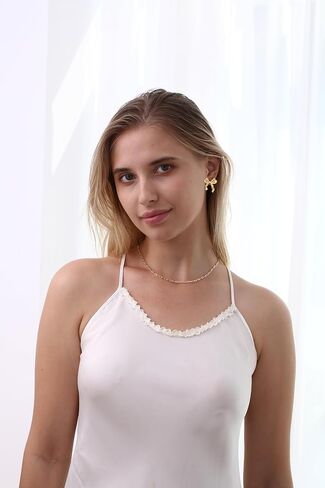 أقراط WEDDINEN الذهبية على شكل فيونكة للنساء أقراط على شكل فيونكة in Saudi Arabia